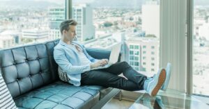 man looking at computer